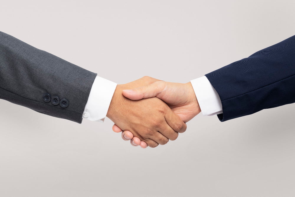 business-agreement-handshake-hand-gesture(1) Apply for Dealership